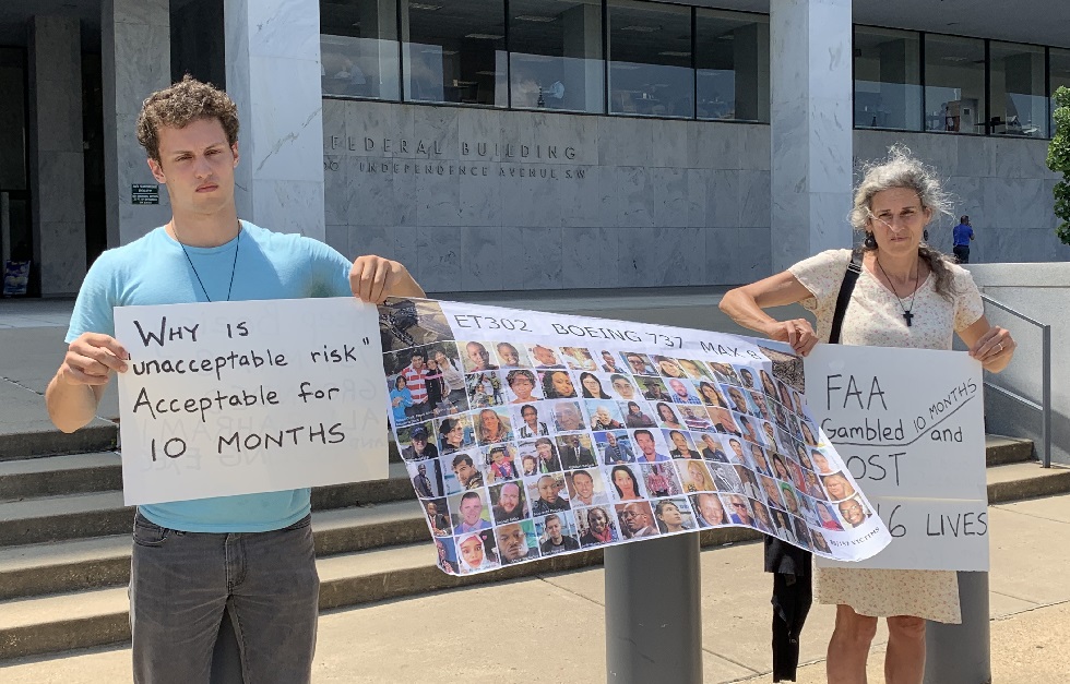 Nadia Milleron and Tor Stumo protesting in front of the FAA