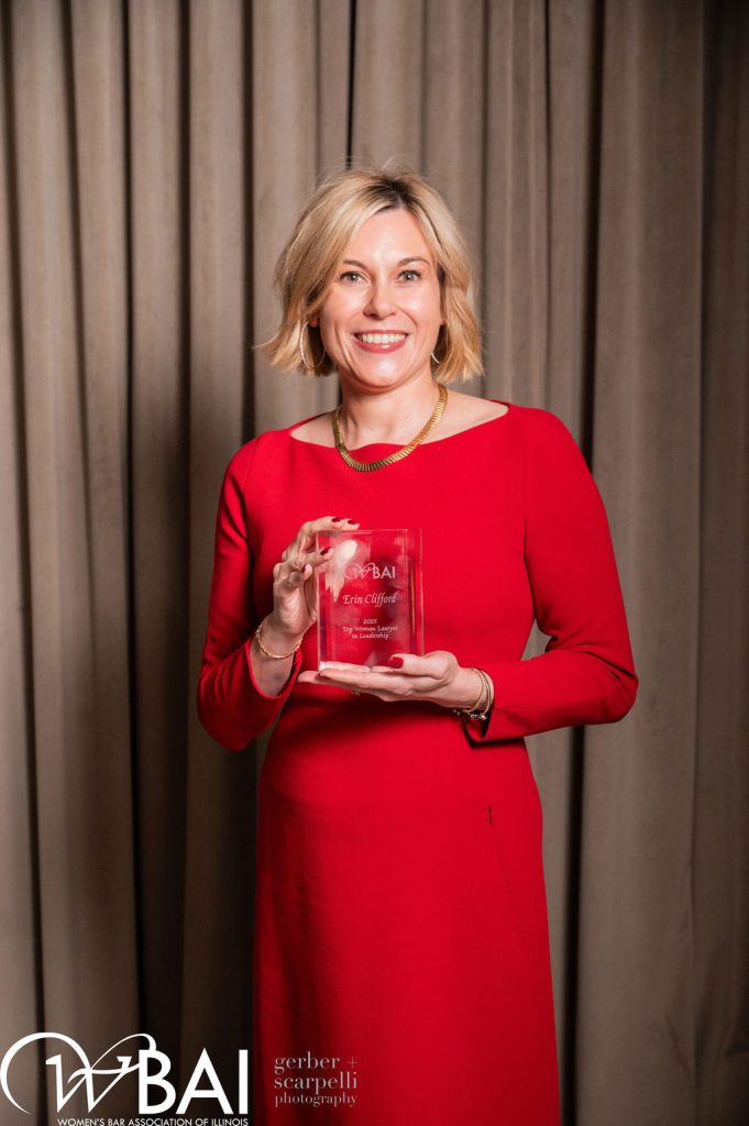 Erin Clifford with WBAI award.