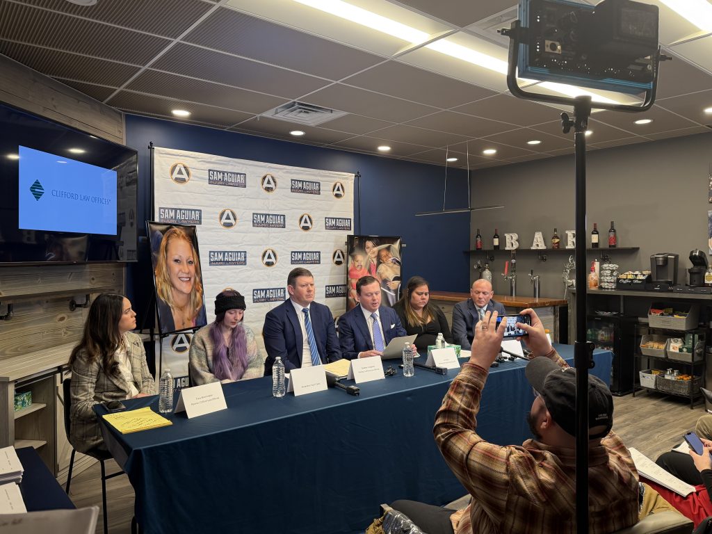 Attorneys address the press.