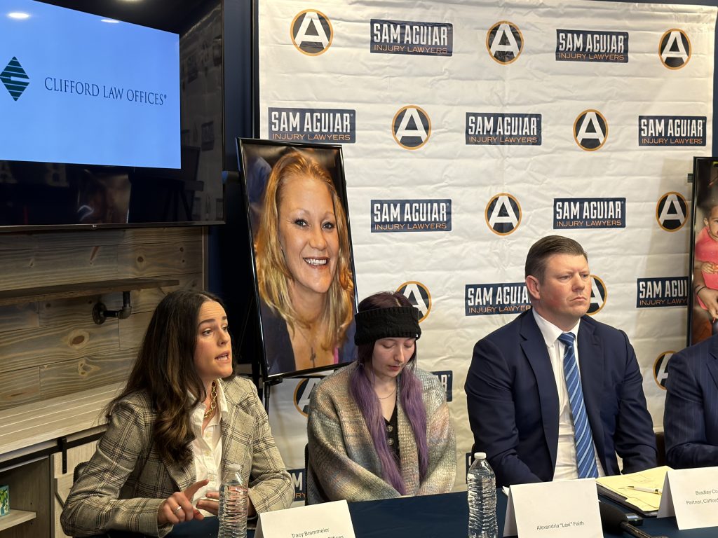 Tracy Brammeier addresses the press at UPS lawsuit press conference.