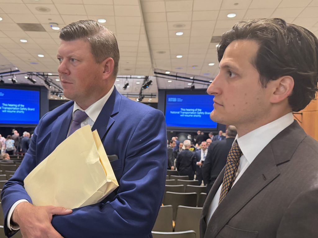 Bradley M. Cosgrove and Scott M. Kater, partners at Clifford Law Offices, listen as the NTSB presents video, photos, and animations of the UPS cargo jet crash.