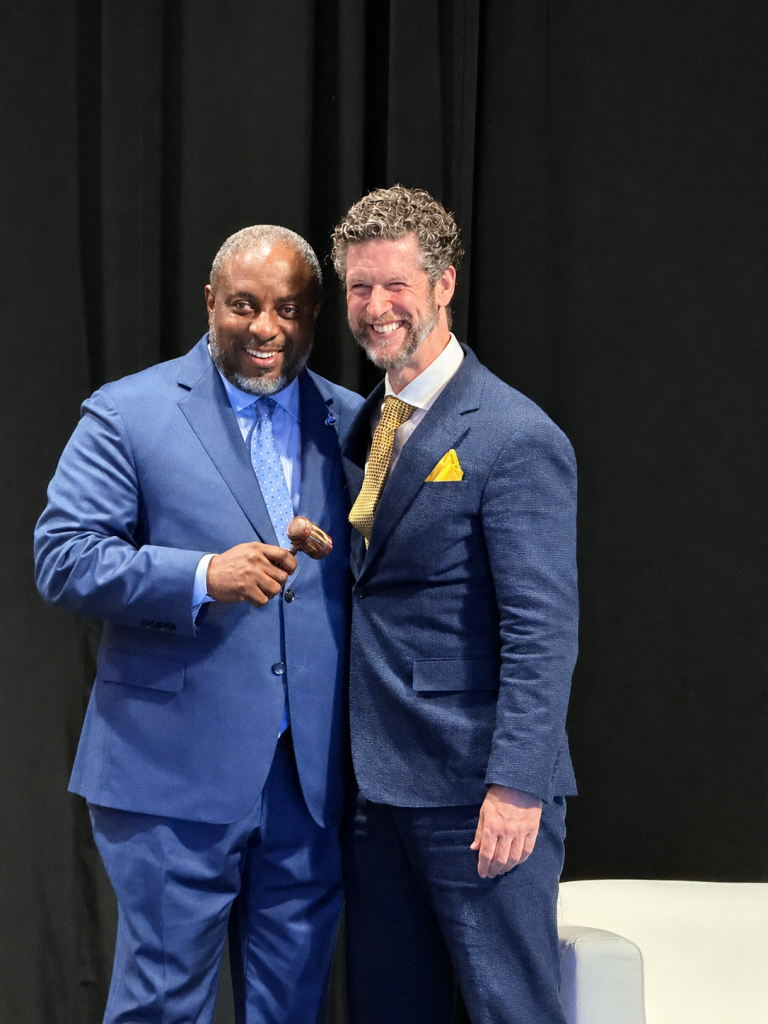 The gavel being passed to Juan Thomas by outgoing NCBP President Patrick Palace who is also a Past President of the Washington Bar Association. 